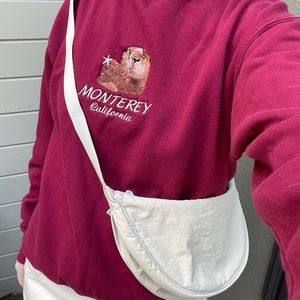 Embroidered Monterey otter maroon crewneck sweatshirt